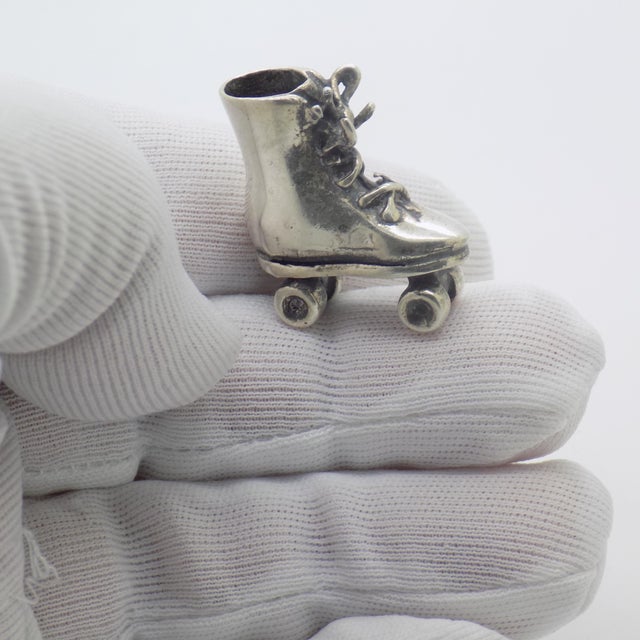This rare and charming roller skate miniature was handcrafted in Italy during the 1970s/1980s, a period rich in playful...