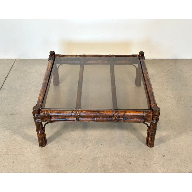 1970s bamboo coffee table, smoked glass top, height at top 30 cm.