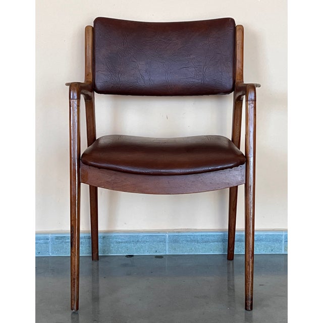 Rare form, teak frame arm chairs with leather seats and backs, in style of Grete Jalk or Erik Buch . Armchairs in very...