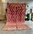 This authentic vintage Moroccan Talsint rug is a rare example of traditional Berber craftsmanship from southeastern...