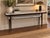 Stunning Chantal Console by Porada, an elegant example of contemporary Italian design. The console features two...