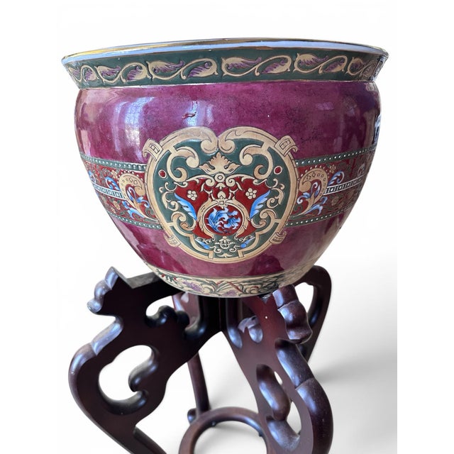 Bring classic elegance to your interior with this exceptional pair of vintage Chinese export porcelain fishbowl planters...