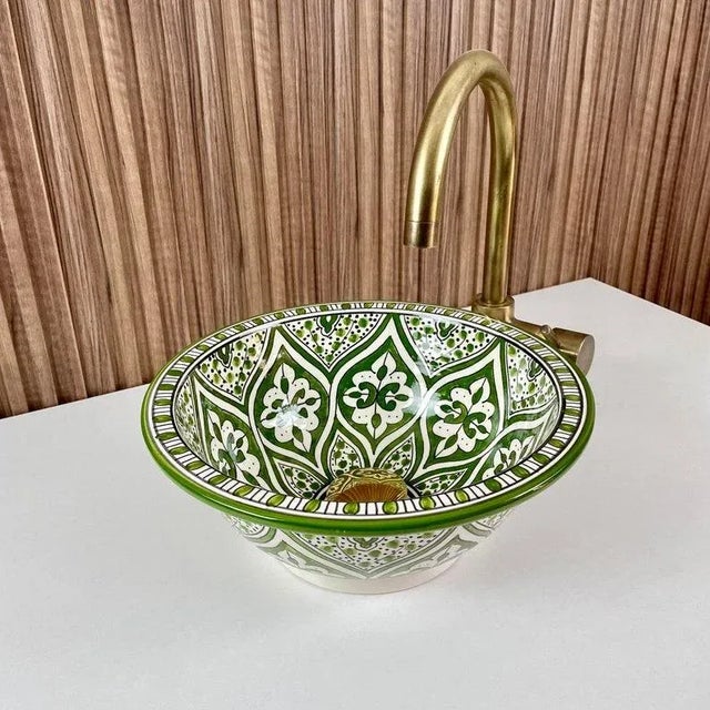 1) Experience the unparalleled beauty of our Flower Ceramic Sink Bowl, expertly crafted by skilled Moroccan artisans. This...