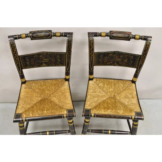 Antique Hitchcock Black and Gold Harvest Stencil Rush Side Chairs - a Pair. Circa Late 19th Century. Measurements: 34" H x...