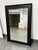 Design Plus Gallery presents a Wall Mirror from Brownstone Furniture. This rectangular mirror has a broad wood frame with...