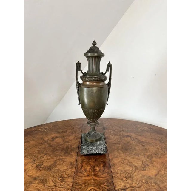 Fine quality pair of large antique Victorian bronze urns have a pair of fine quality antique Victorian bronze urns of a...