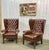 Pair of Chesterfield wingback armchairs in brown leather from the 70s - L=80cm D=68cm HD=1m04 HA=43cm.