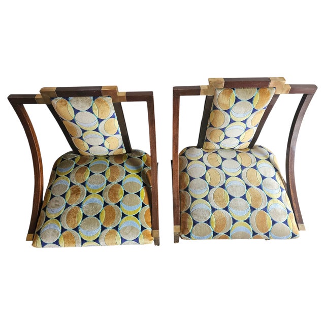 Fabulous pair of side chairs in very unique midcentury style. Square design of the chairs is balanced with graceful arch...