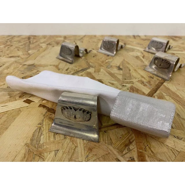 Set of ten knife or chopstick rests Banner shaped By Gucci Italy 1970s This piece has an attribution mark, I am sure that...