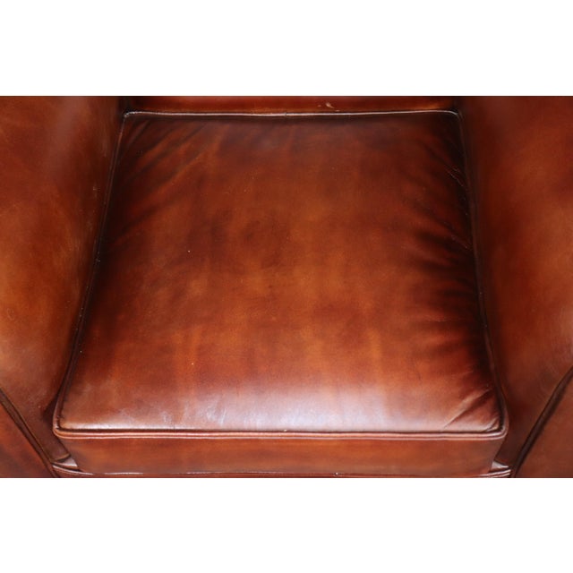 This exceptional pair of French Art Deco leather club chairs captures the refined elegance and understated luxury that...