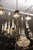 This is a fantastic example if a vintage gilt Italian tole chandelier,. Six gracefully curved arms emerge from a central...