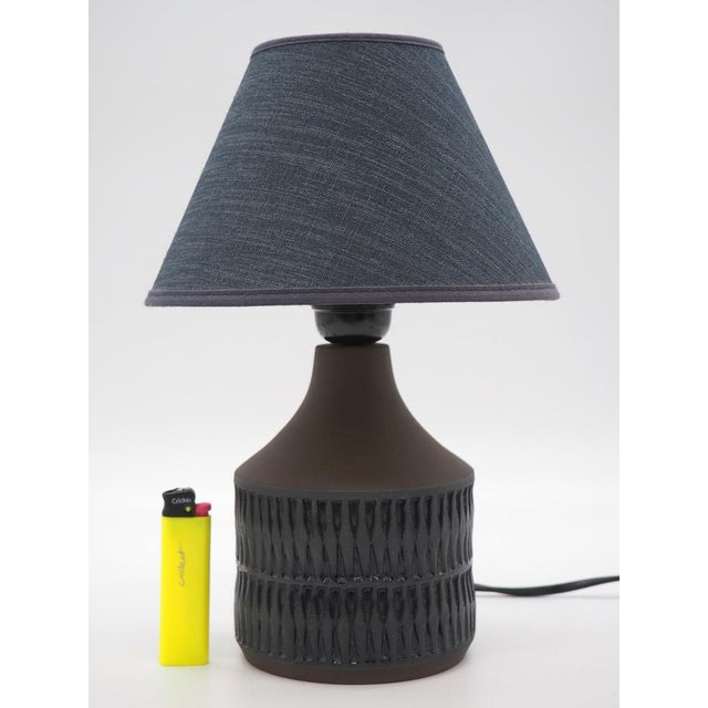 Marked at the bottom. Nr 109. Handmade. Lampshade is included. This piece has an attribution mark, I am sure that it is...