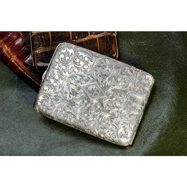 An exquisite example of early 20th-century craftsmanship, this circa 1910 cigarette case is rendered in rich .950 sterling...