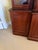 This antique English mahogany three door breakfront bookcase from circa 1850 is a stunning piece of furniture. Standing at...
