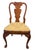 An exceptional and beautifully figured set of ten Queen Anne style dining chairs, including eight side chairs and two...