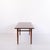 Coffee table crafted from rosewood and manufactured by jason design around 1960. The table features a rectangular top and...