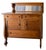 This American Empire-style sideboard. Crafted from high-quality quarter-sawn oak, the piece showcases the dramatic "tiger"...