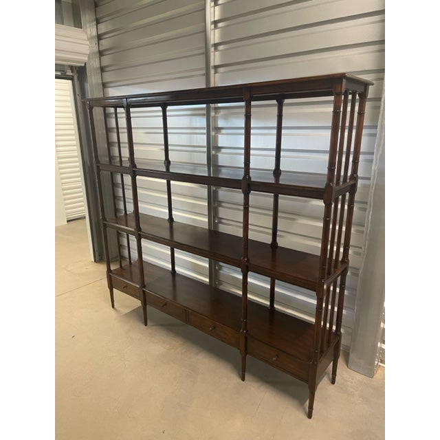 A custom made-to-order etagere by Walter E. Smithe. Four open shelves for displaying books and treasures with an enclosed...