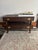 Mastercraft Furniture Co. — Two-Tier Walnut & Brass Campaign Side Table, c. 1950s–60s A beautifully crafted mid-century...