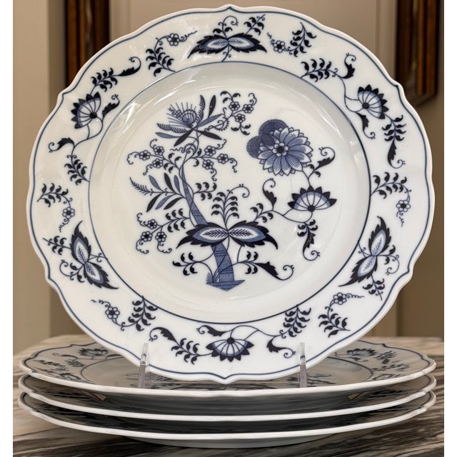Presenting a set of four Mid-Century Blue Danube dinner plates, made in Japan. In the timeless, beloved blue and white...