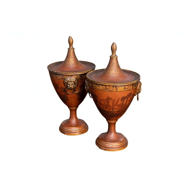A pair of Napoleon III period Italian lacquered tin vases with lids from the 19th century with monochrome village and...