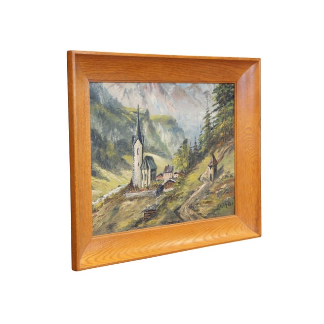 Early to mid 20th century oil on board landscape painting depicting a church steeple in a little Alpine mountain village....