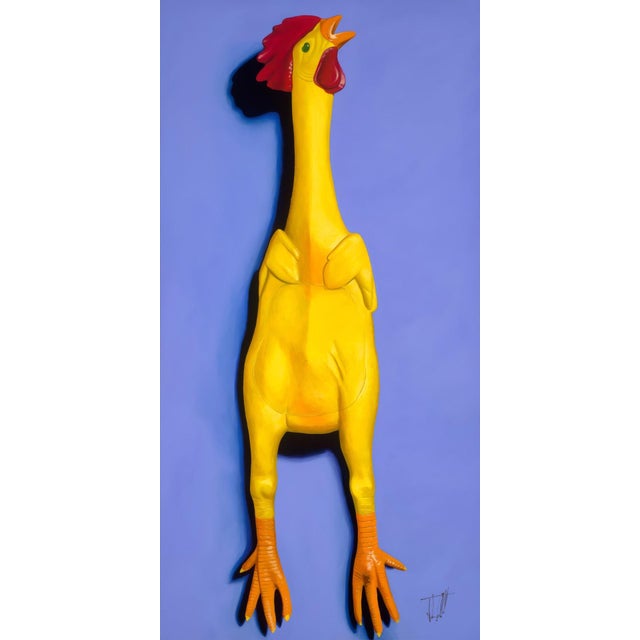 The artwork features a vibrant, oversized rubber chicken rendered in bold acrylics, standing against a soft blue...