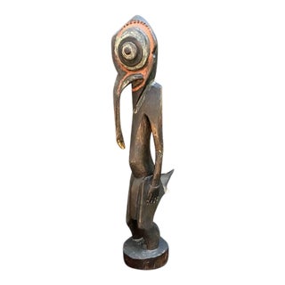 Hand-Carved Tribal Man Sculpture on Metal Stand For Sale