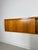 Beautiful vintage mid-century modern floating wall unit by bartels from the 1960s. Elegant minimalist design with warm...