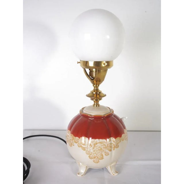 Excellent restored condition,new elektrification. Material brass, opaline shade, ceramic,porcelain. Diameter of shade is...