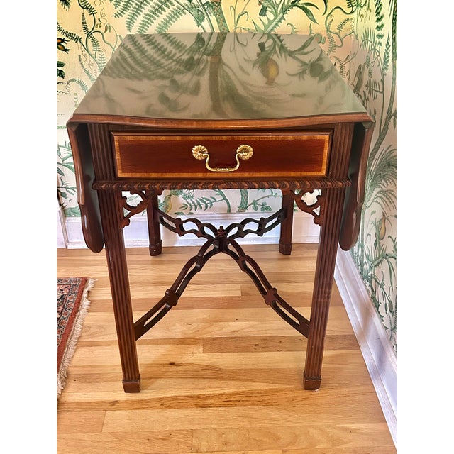This remarkable drop leaf Pembroke table is by Sherrill Furniture and was part of the CTH Occasional Collection. It’s...