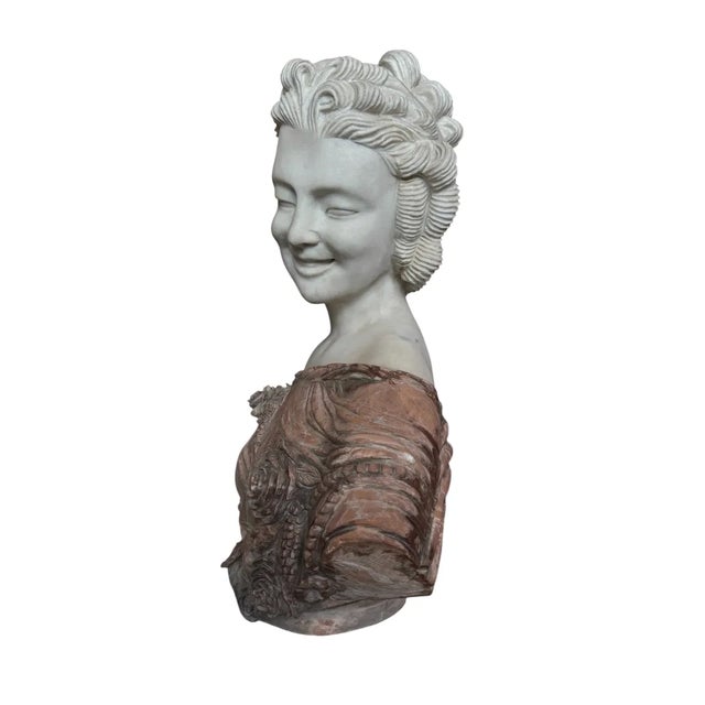 21 1/4”W x 25”H x 9 1/2”D This commanding bust is a captivating study in polychrome marble. The luminous white marble of...