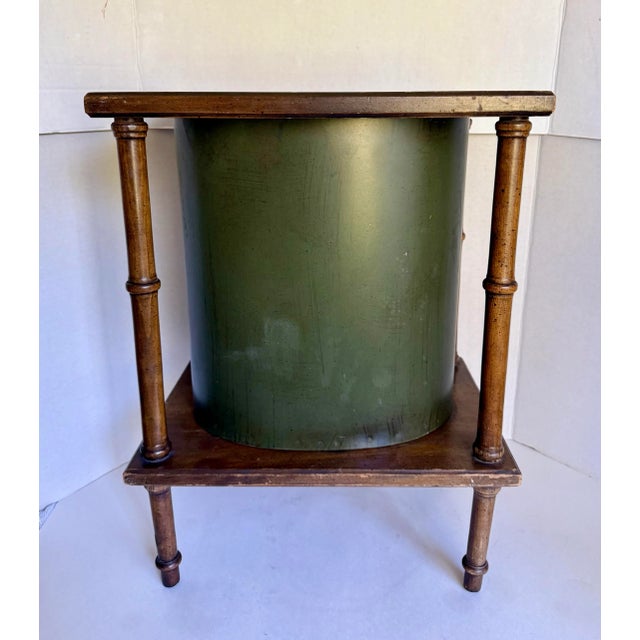 Here is a great wastebasket from the early mid-century, made by Brandt Furniture. The waste bin is actually made from two...