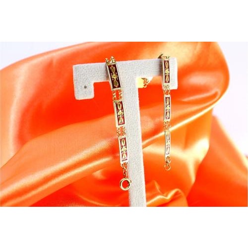 Gold bracelet with enamels and raised floral motifs, articulated links. Metal: Gold. Origin: Portuguese. Brand: Tigre II...