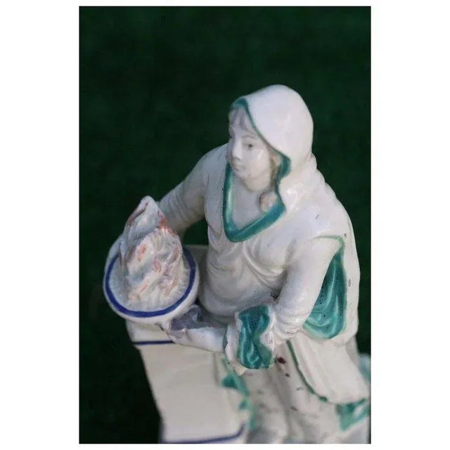 Antique 18th c. pearlware figure representing Medea at the Altar of Diana. This figure also is emblematic of the elements...