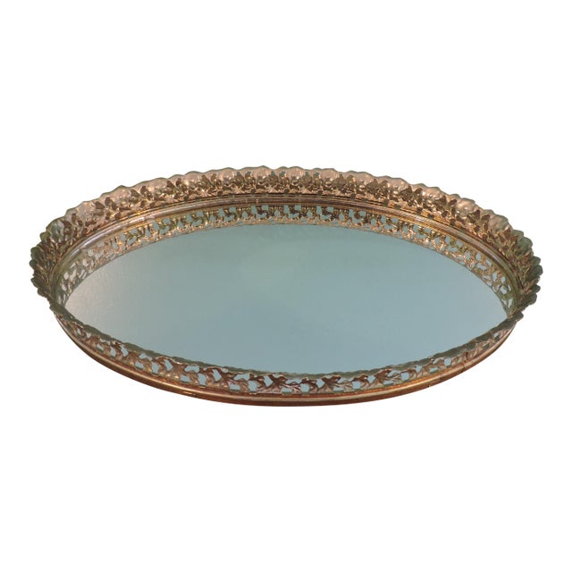 This lovely tray has an ornate edge of flowers that curves outward at top. Mirror appears to be in excellent condition for...