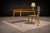 This console and chair ensemble reflects the restrained elegance characteristic of mid-century Brazilian design, where...