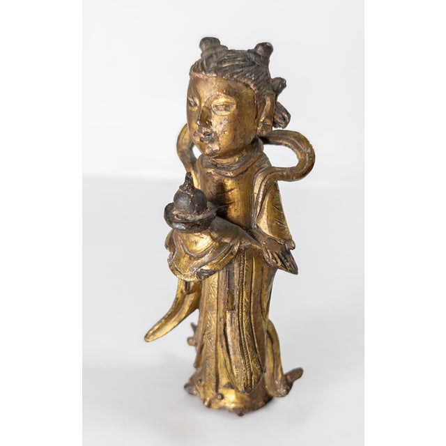 We are selling this Chinese Ming or Qing type heavy cast bronze figure. This bronze figure is a Daoist Guanyin type figure...