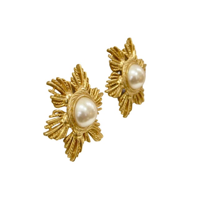 Givenchy 1980s stunning gold-plated starburst glass center pearl clip back earrings Signed, "Givenchy, Paris, New York"...