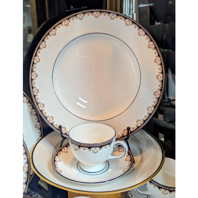Wedgewood Medeci Fine China, 18 pieces total, excellent condition. 2 dinner plates, 4 cups and saucers, 3 bed plates, 4...