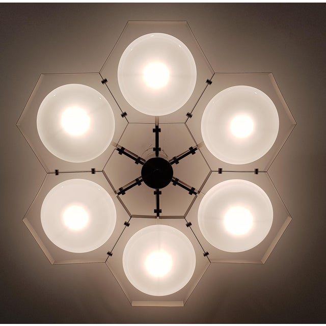 Italian midcentury flush mount with six glossy white Murano glass shades mounted on solid brass frame in satin nickel...