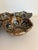Beautiful set of 7 Ken Edwards lotus bowls each with hand-painted blue and brown floral patterns. These pieces were made...