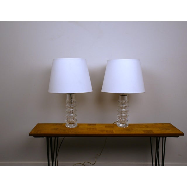 Rare pair swedish art glass table lamps by carl fagerlund for orrefors, 1950s. very fine pair cut art glass table lamps....