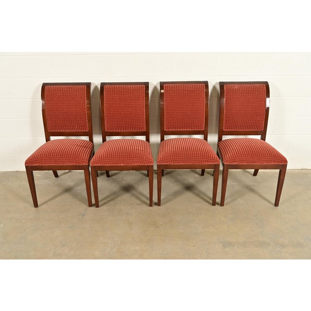 A gorgeous set of four Regency style side chairs or dining chairs By Smith & Watson USA, Circa Late 20th Century Carved...