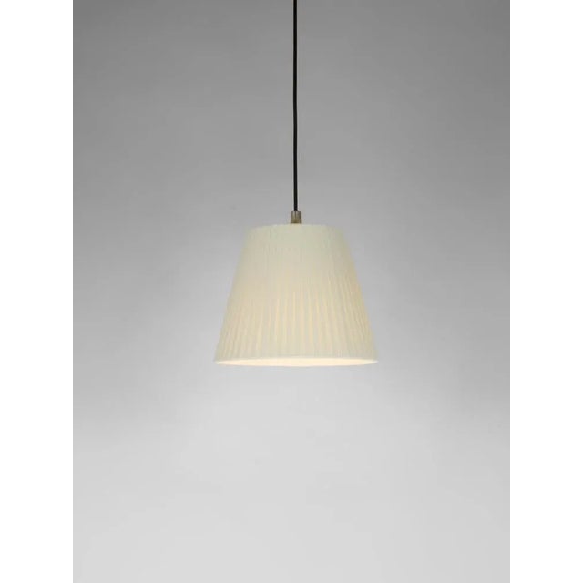 Natural sísísí cónicas pt1 pendant lamp by santa & cole dimensions: d 20 x h 16 cm. Materials: metal, ribbon. Available in...