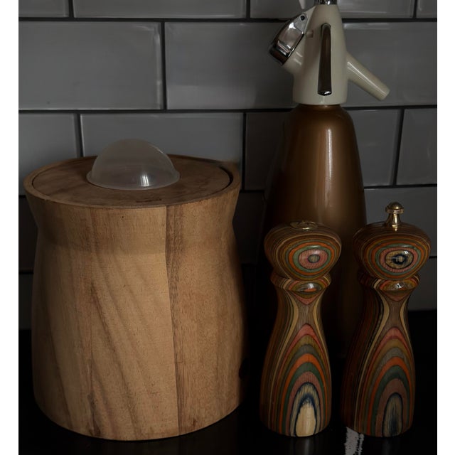 Sculptural Scandinavian modern wood ice bucket featuring a clear lucite dome lid and warm natural grain. An uncommon form...