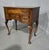 A very nice Queen Anne style burr walnut bowed low boy with four drawers, original brass handles, oak lined throughout, in...