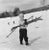 New England Skiing Starters 1955 by Slim Aarons Slim Aarons Limited Estate Edition A young skier prefers to carry his skis...