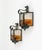 Midcentury amazing pair of sconces in wrought iron and multicolor hammered glass produced by Longobard the concurrent of...