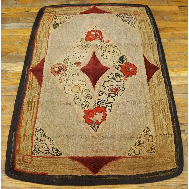 Antique Amercian hooked rug, size: 2'8"x4'0". Antique American Hooked Rug American Geometric, Circa Date: 1890s. This...
